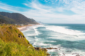 Pacific ocean from Brays Point, Oregon, USA. Wide view of the foaming waves rolling ashore