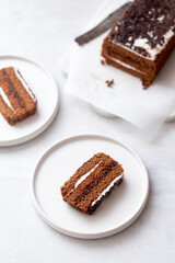 Fototapeta na wymiar Delicious Chocolate Layer Cake on white background