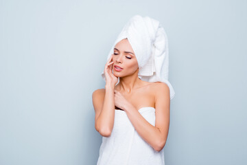 Close up photo portrait of attractive with perfect skin in bathroom she her touching facial skin enjoy effect after using new soap towel around body and on head hair isolated on grey background