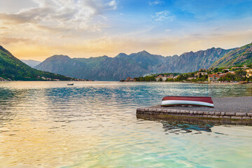 Obraz premium Bay of Kotor, Adriatic Sea, Montenegro. Famous tourist attraction with fishing boats, small piscatorial villages and mountains surroundings.