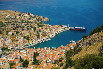 Naklejka na ściany i meble Panoramic view of the picturesque village on the Greek island of Symi, Dodecanese, Greece