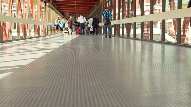 VANCOUVER CANADA - JULY 2011 Time lapse of commuters departing the SeaBus on the walkway, Vancouver, B.C.