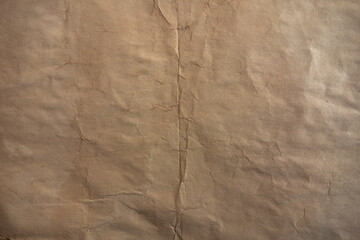 Texture of old crumpled paper with yellow cracks