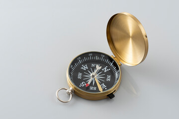 Navigation compass on the gray background.