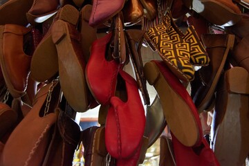 Closeup shot of leather sandals in a flea market