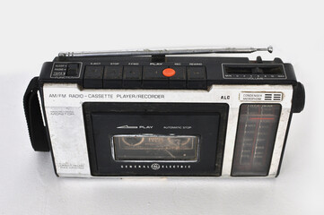 Old vintage classic Cassette Player isolated against white background. Used in the 90s, 80s, collectibles retro style objects