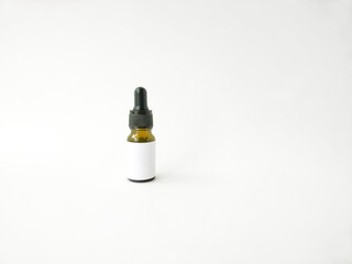  cosmetic serum with a pipette on a white background. self care concept. personal care.