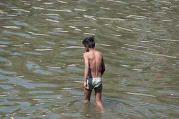 a young boy in the water 
