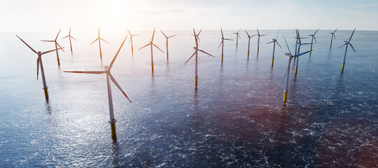 Offshore wind turbines farm on the ocean. Sustainable energy