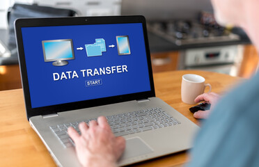 Fototapeta na wymiar Data transfer concept on a laptop