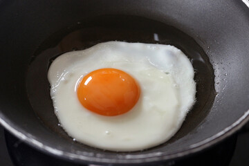 fried egg in a frying pan