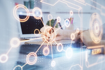 Social network theme hologram over woman's hands writing background. Concept of international people connect. Double exposure