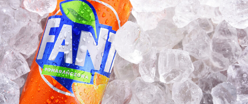 Can of carbonated soft drink Fanta in crushed ice