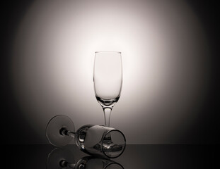 empty champagne glasses on a beautiful gradient background