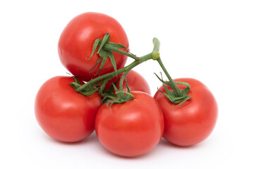 Fresh Raw Tomatoes on the white background. Close-up detail.