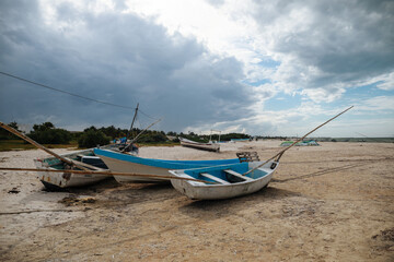 Naklejka na ściany i meble Fishing boats on the sand in Mexico,Progreso,Yucatan.