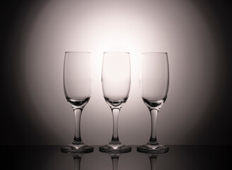 empty champagne glasses on a beautiful gradient background