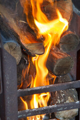 Start of making coals for a barbecue braai fire in George South Africa in a custom built built in barbecue fire place.