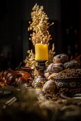 lighted candle, a religious tradition, a symbol of the Christian faith, a wax candle burns with an...