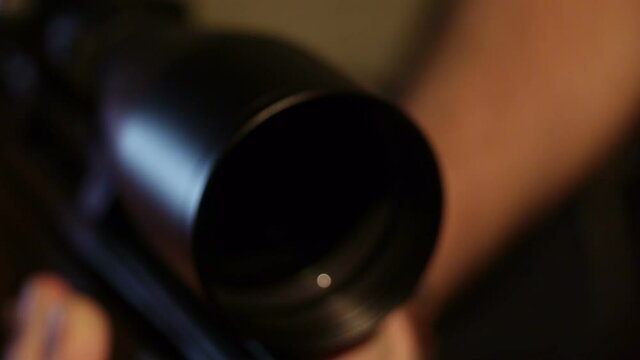 stock footage hunter with rifle with telescopic sight