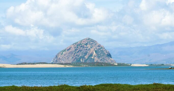 Moro Bay Rock looking out over sand dunes in California
