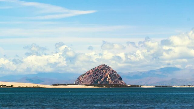 Ocean Bay time lapse looking over the ocean and sand dunes toward Moro Bay Rock near San Luis Obispo and Los Osos California