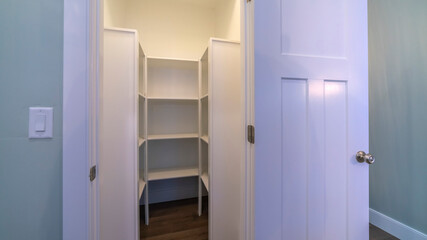 Panorama frame Looking into empty interior of a walk-in closet