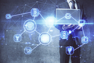Media network theme hologram with man working on computer on background. Concept of internet communication. Double exposure.