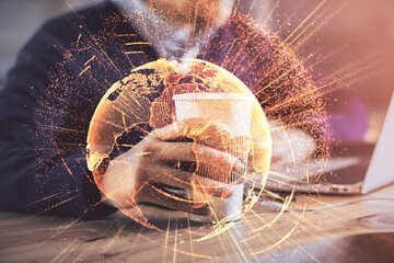 Media network theme hologram with man working on computer on background. Concept of internet...