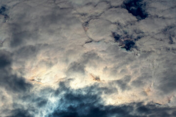 Sky with dark clouds and sun, beautiful background