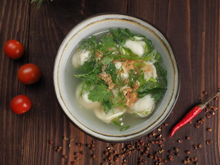 Dumplings with meat and sour cream