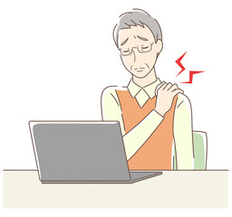 パソコンの前で肩が凝る男性