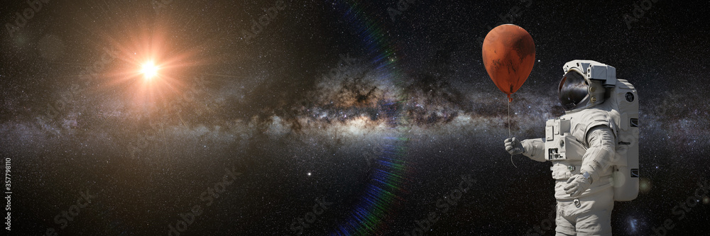 Canvas Prints astronaut with mars balloon in front of the milky way galaxy