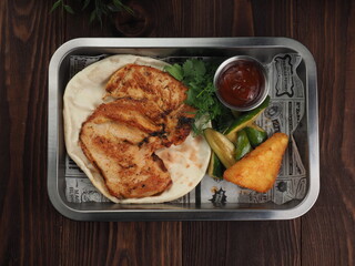 Grilled chicken fillet steak in maracan spices