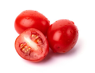 red ripe tomatoes with dewdrops isolated on a white background