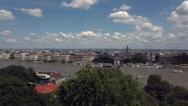 Time-lapse of the daube diver in Budapest - clouds are moving and boats are passing by