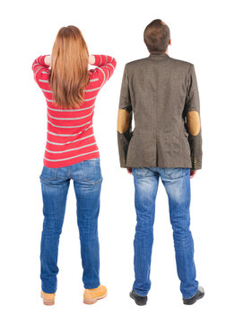 Back view couple in sweater. beautiful man and woman.