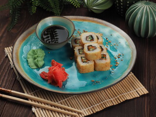 Fresh and tasty sushi on the wooden table