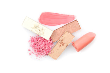 Smears of different decorative cosmetics on a white background isolated
