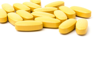 Multivitamin and mutimineral pills, nutritional Supplement on white background in close-up