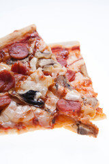 Hunting pizza with sausages, mushrooms and cheese sauce