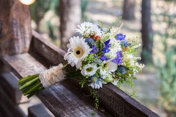 wedding bouquet on a wooden table