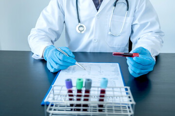 Professional doctors perform find virus tests from samples of blood tests to diagnose coronary...