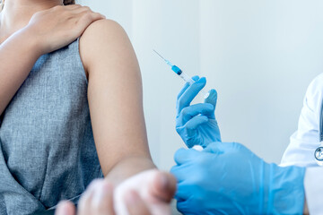 doctors vaccinated with syringes to prevent epidemics at hospitals, health care and medical concepts