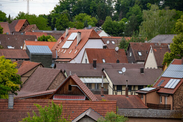Fototapeta na wymiar Many roofs of old houses