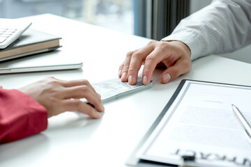 Businessmen make an agreement with the money proposed his partner to bribe in the company. The concept of corruption