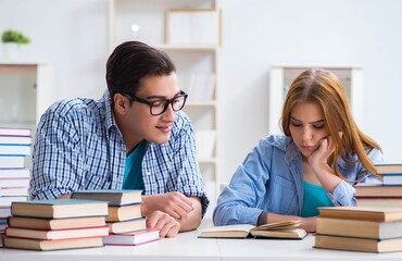 Pair of students studying for university exams