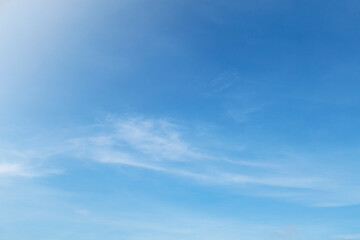 Beautiful sunny blue sky background with white clouds