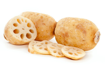 Lotus root slices isolated on white background.