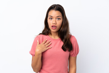 Fototapeta premium Young Colombian girl over isolated white background surprised and shocked while looking right